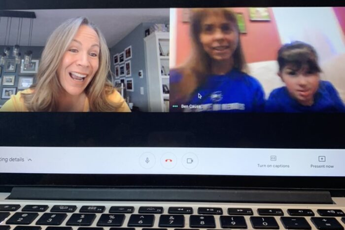 Laptop showing a video chat between Rachel and children